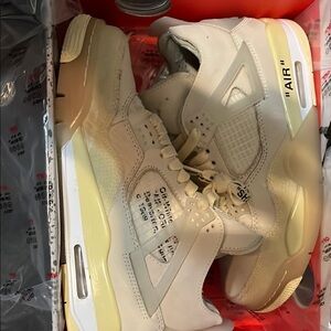 Off-White x Nike Air Jordan 4 Sneakers